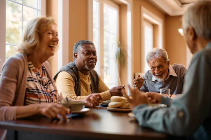 Residents enjoying breakfast at Kauhale Heritage Woods Senior Living